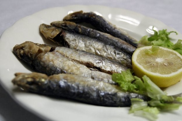 Todas las noches. Sardinas asadas.