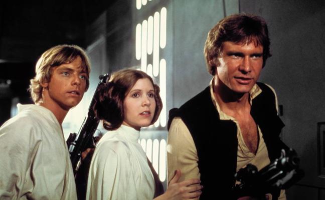 Mark Hamill, Carrie Fisher y Harrison Ford en una escena de la Guerra de las Galaxias Episodio IV./